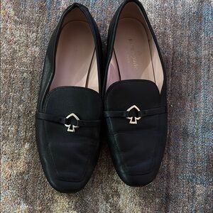Kate Spade Black Slip-On Loafers with Gold Embellishment